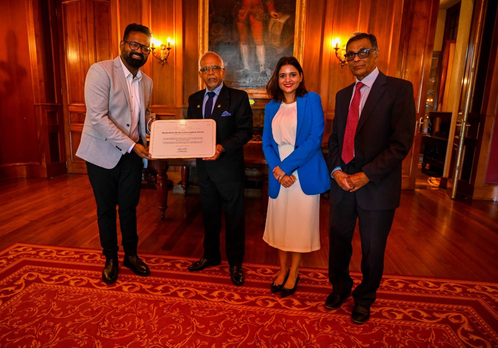Presenting the book You Were Our Best Teachers to the President of Mauritius